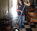 Biologist working to catch mousquitos inside a building in Ecuador